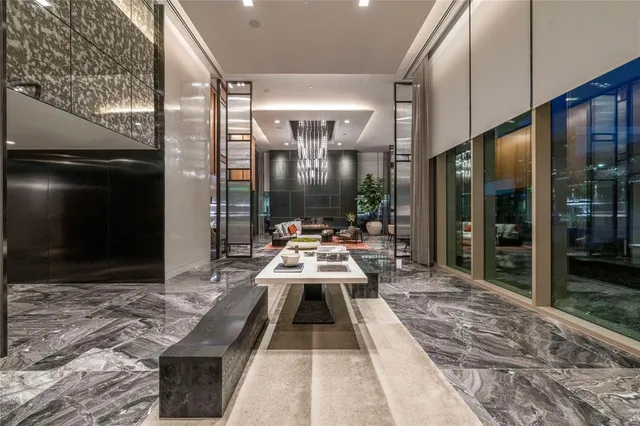 a view of swimming pool with seating area