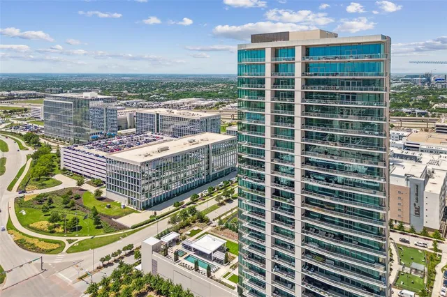 a view of a city with tall buildings