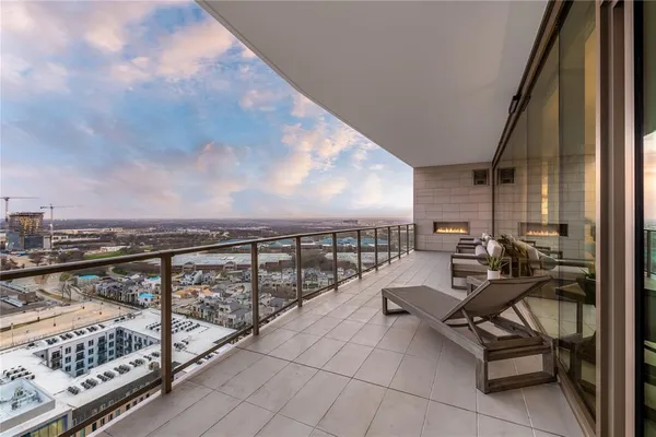a view of a balcony with chair