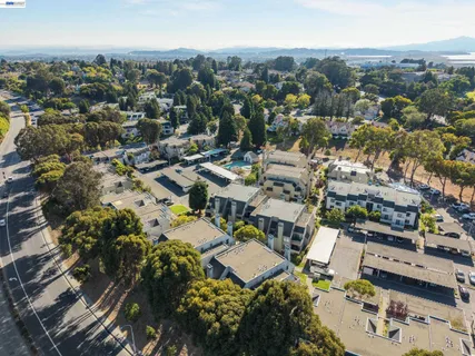 an aerial view of a city with lots of residential buildings