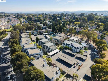 an aerial view of a city with lots of residential buildings