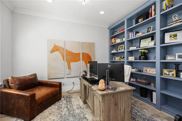 a bathroom with a sink a mirror and toilet