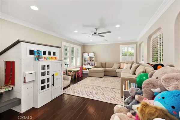 a bedroom with double bed and a large mirror