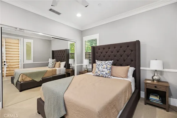 a en suite bathroom with a sink and a mirror
