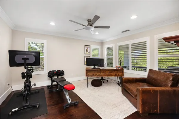 a spacious bathroom with a double vanity sink large mirror and a bathtub