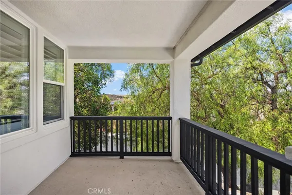 a swimming pool with an outdoor seating