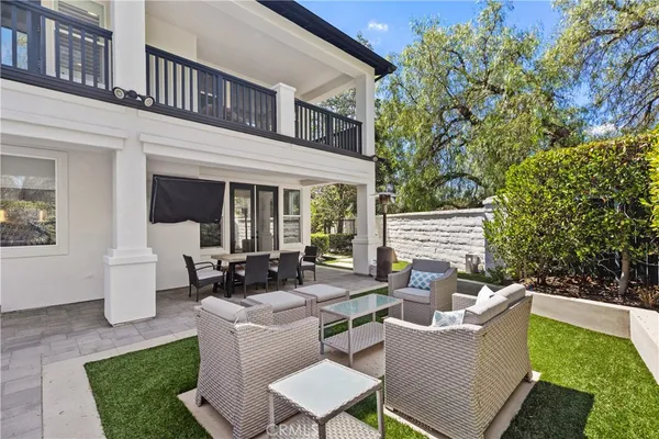 a view of a grassy area with an trees