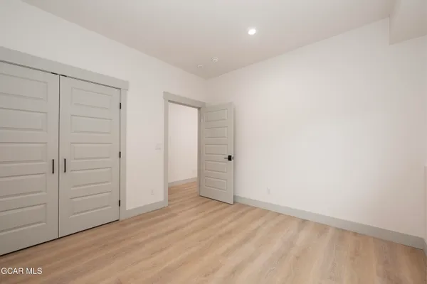 an empty room with white walls