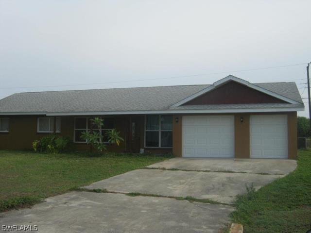 409 East Jasmine Road Lehigh Acres, FL 33936 - Photo 1 of 15 Gallery Image 1