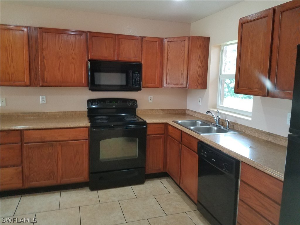 409 East Jasmine Road Lehigh Acres, FL 33936 - Photo 2 of 15 Gallery Image 2