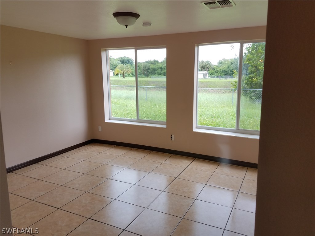 409 East Jasmine Road Lehigh Acres, FL 33936 - Photo 3 of 15 Gallery Image 3