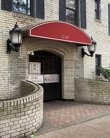 a front view of a house with a garage