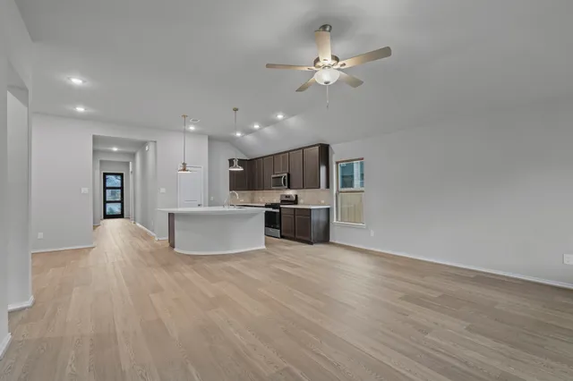 a view of kitchen with cabinets and stainless steel appliances