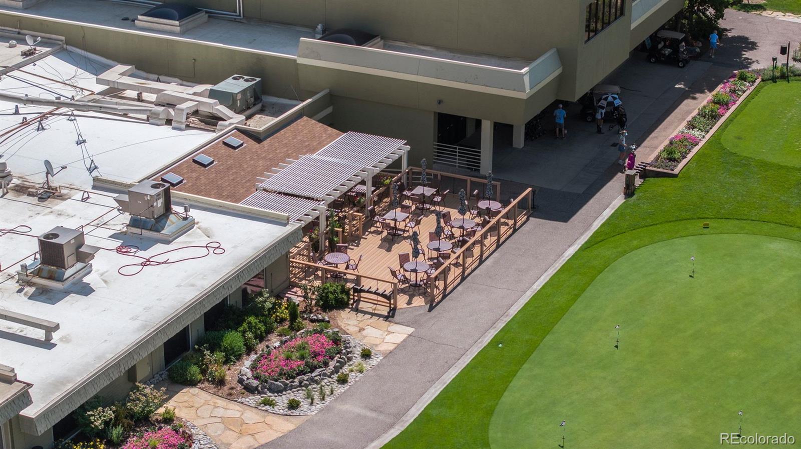 610 South Clinton Street, Unit 10A Denver, CO 80247 - Photo 34 of 40 an aerial view of a house with a garden