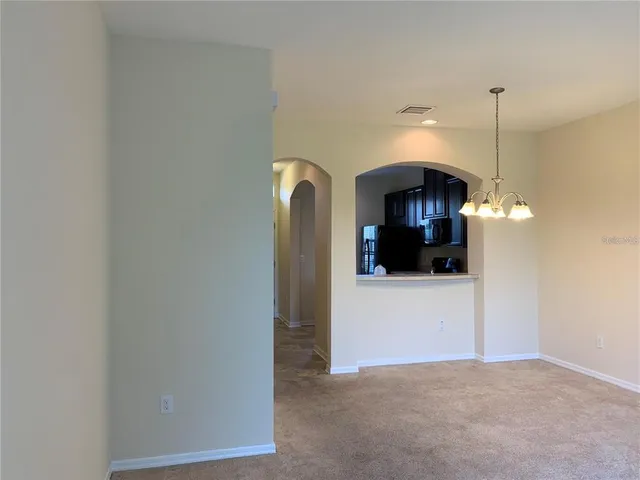 a view of a glass door with a balcony