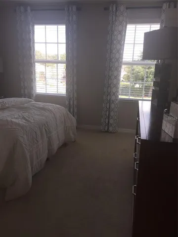 a bathroom with a toilet a sink and bathtub