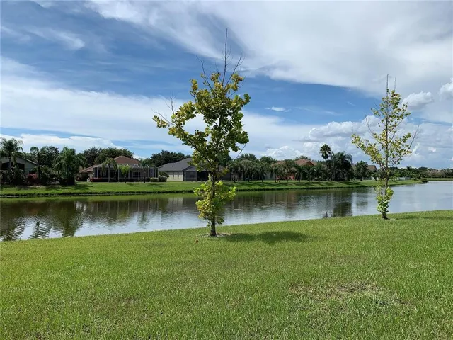 a view of a lake from a balcony