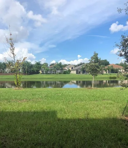 a kitchen with wooden cabinets