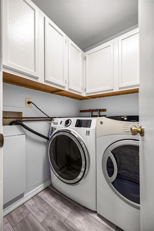 10245 Southwest 105th Street Ocala, FL 34481 - Photo 39 of 83 a utility room with dryer and washer