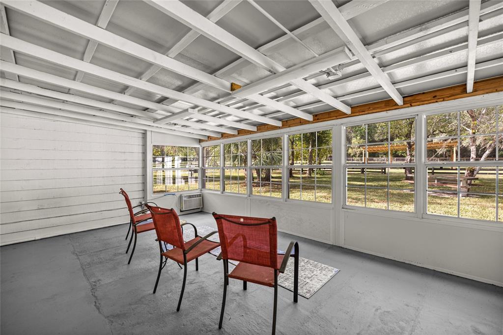 10245 Southwest 105th Street Ocala, FL 34481 - Photo 42 of 83 a view of a dining room with furniture window and outside view