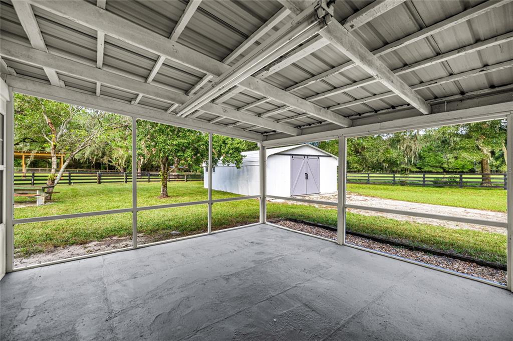 10245 Southwest 105th Street Ocala, FL 34481 - Photo 47 of 83 a view of a house with backyard and porch