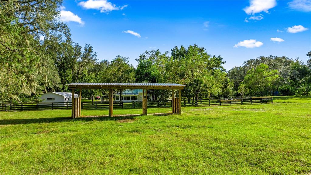 10245 Southwest 105th Street Ocala, FL 34481 - Photo 65 of 83 a view of an house with a park