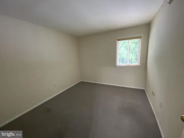 an empty room with a door