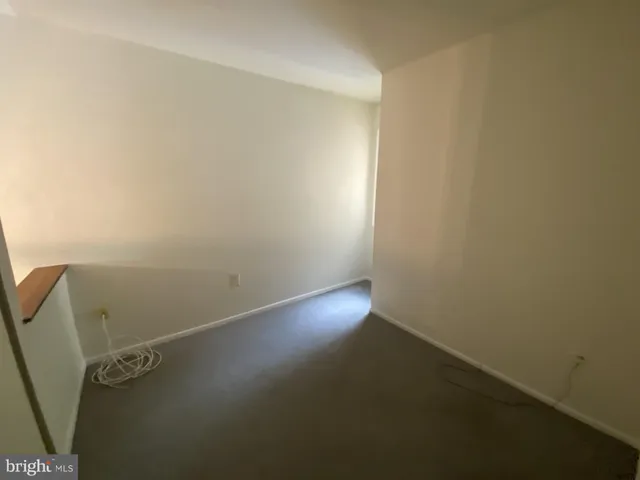 a bathroom with a shower and toilet