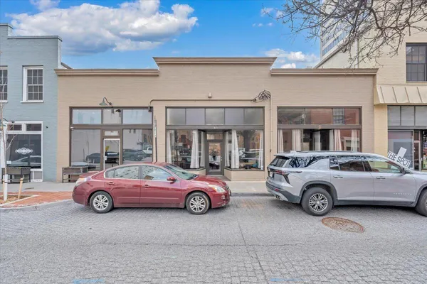 a car parked in front of a building