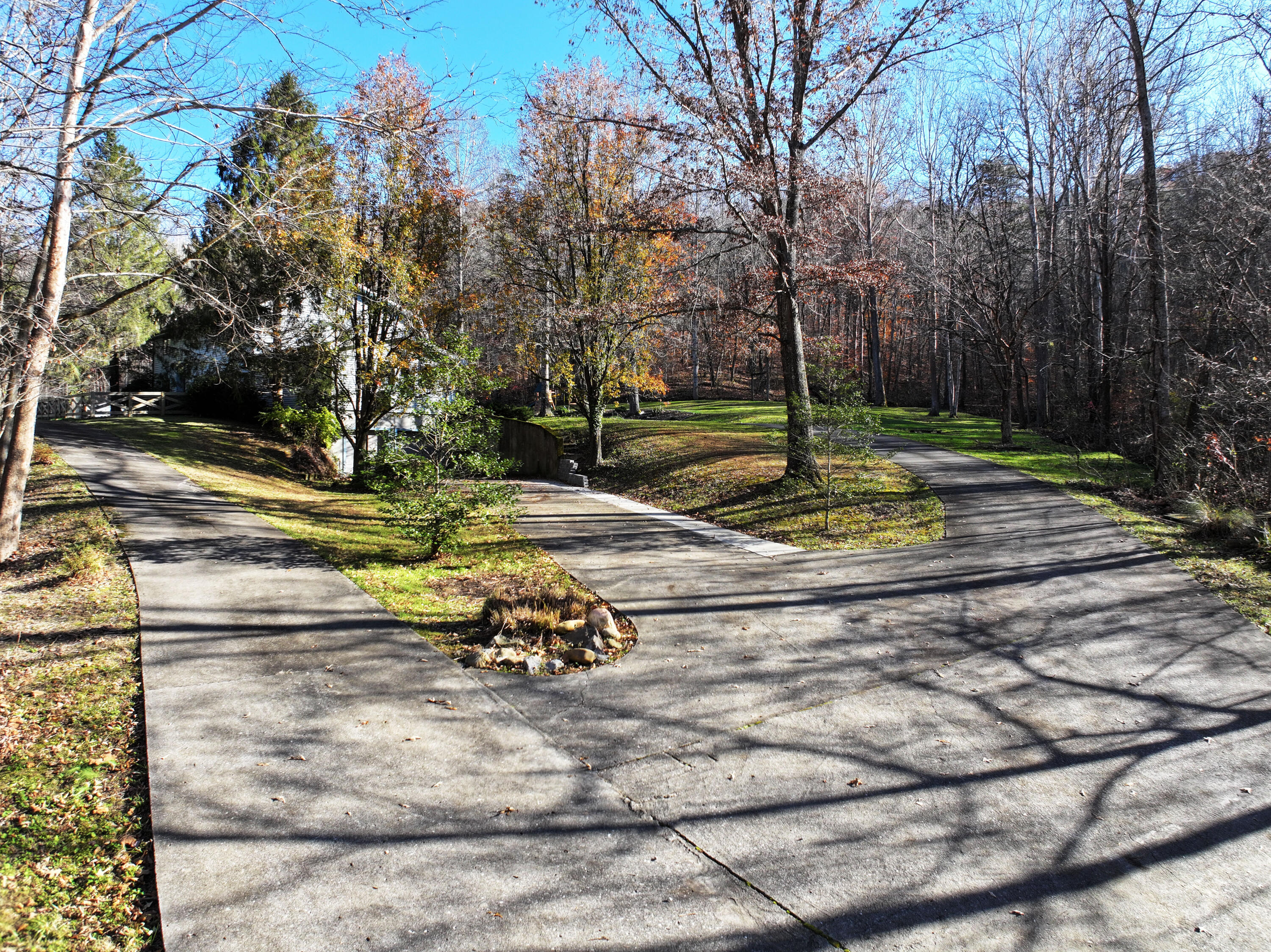 820 Sweet Lick Road Ravenna, KY 40472 - Photo 9 of 73 Impressive wrap-around concrete driveway enhances both function and luxury!