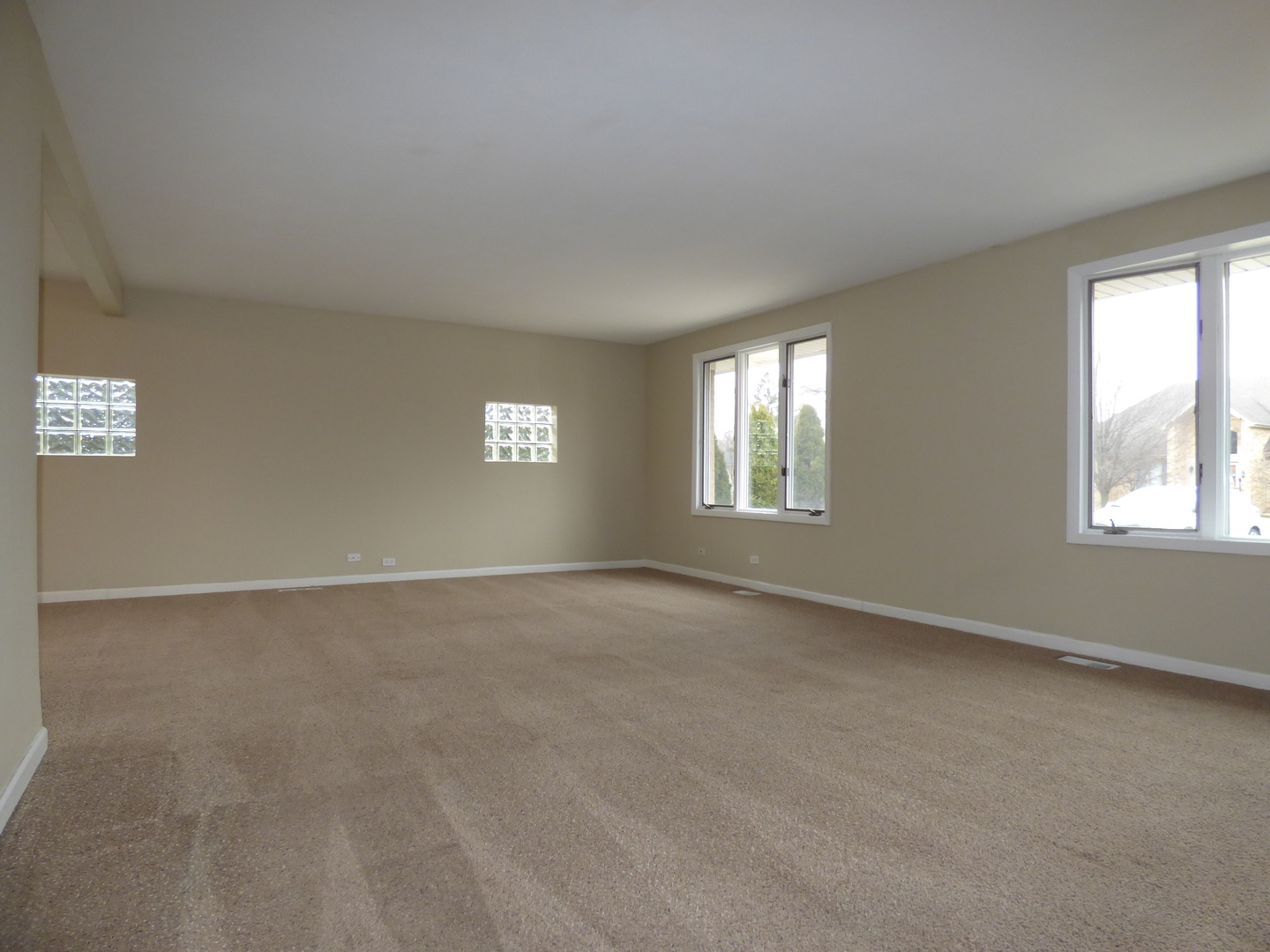 4N261 7th Avenue Addison, IL 60101 - Photo 3 of 31 a view of an empty room with windows
