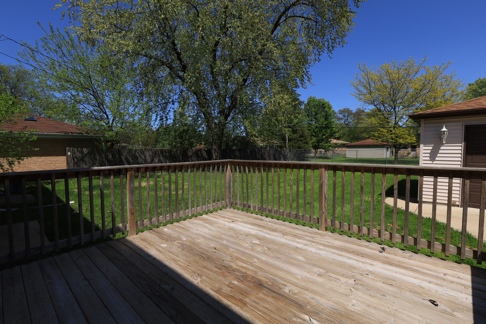4N261 7th Avenue Addison, IL 60101 - Photo 27 of 31 a wooden deck with lake view