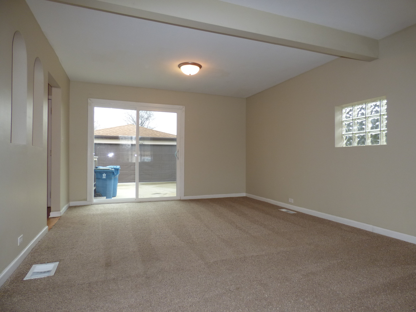 4N261 7th Avenue Addison, IL 60101 - Photo 4 of 31 a view of an empty room with a window