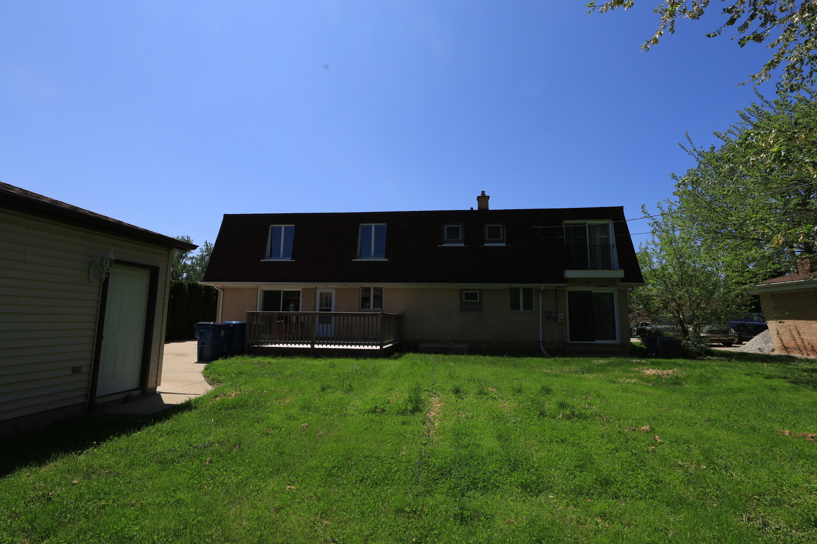 4N261 7th Avenue Addison, IL 60101 - Photo 31 of 31 a view of an house with backyard and a tree