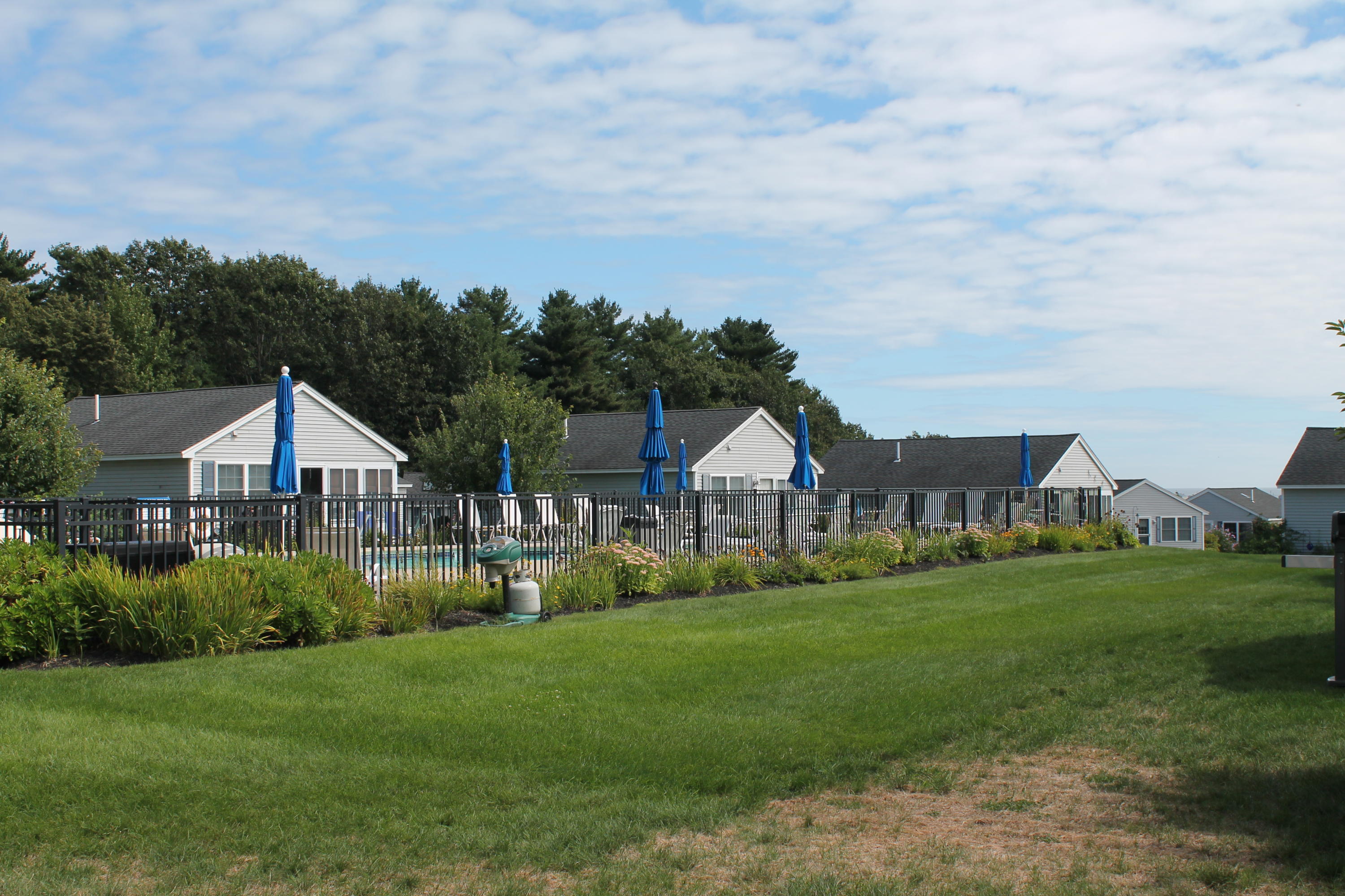 1413 Post Road, Unit 19 Wells, ME 04090 - Photo 1 of 30 Easy access to pool from your backyard