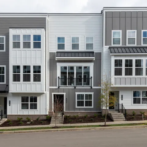a front view of a building with windows