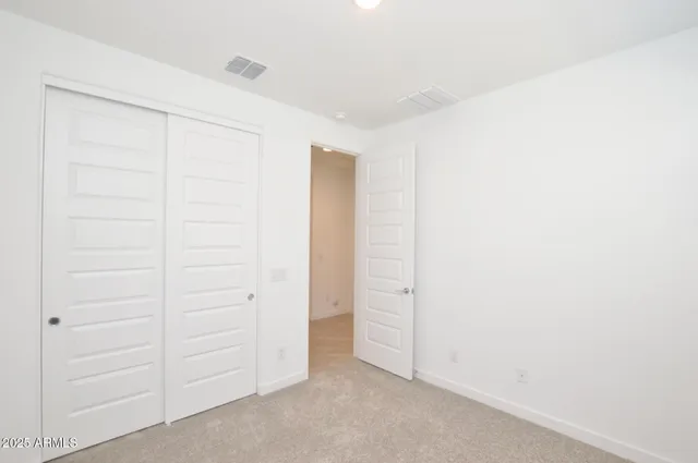 an empty room with closet