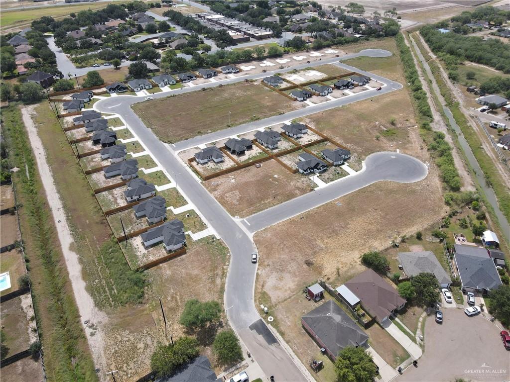 2304 Emily Street Weslaco, TX 78596 - Photo 6 of 6 an aerial view of residential houses with outdoor space