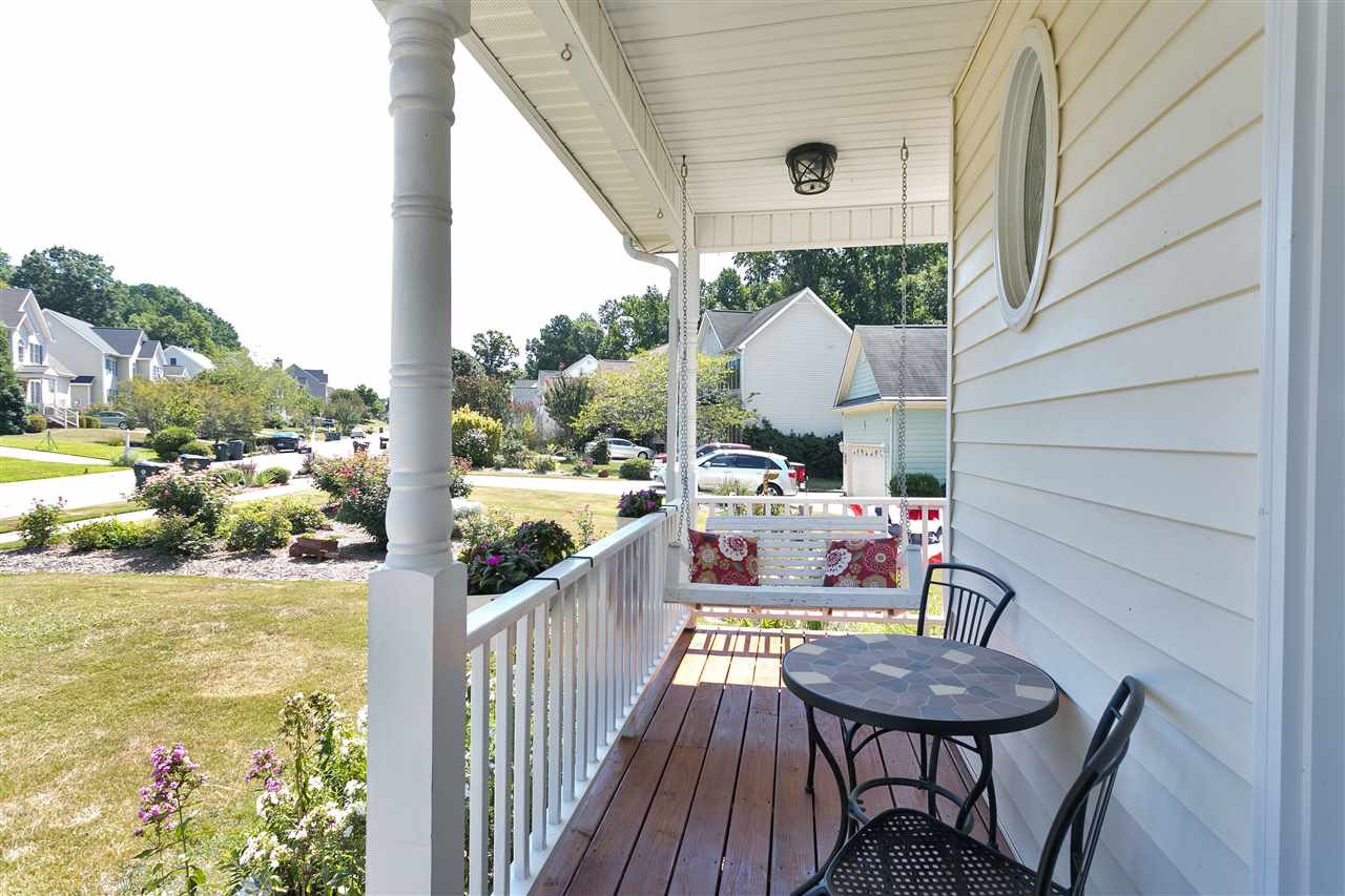 Come visit this sweet home and sit on your new front porch! Front Porch