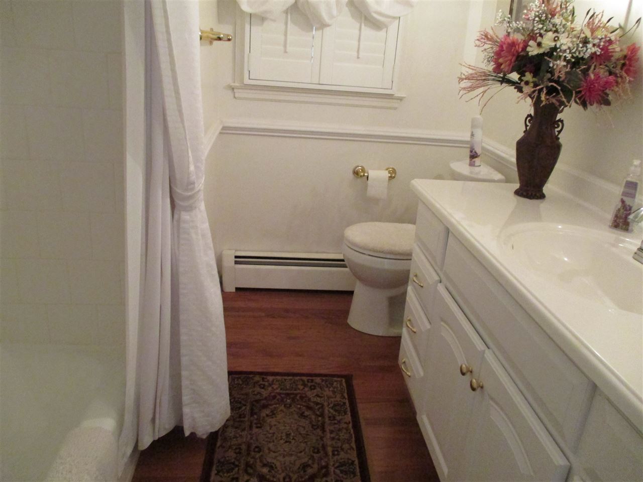 1220 Pinehurst Road Staunton, VA 24401 - Photo 10 of 24 a bathroom with a toilet and a sink
