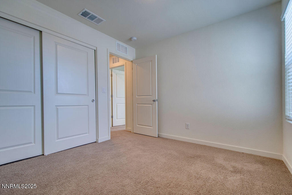 604 Selene Moon Street Reno, NV 89506 - Photo 16 of 40 an empty room with closet area