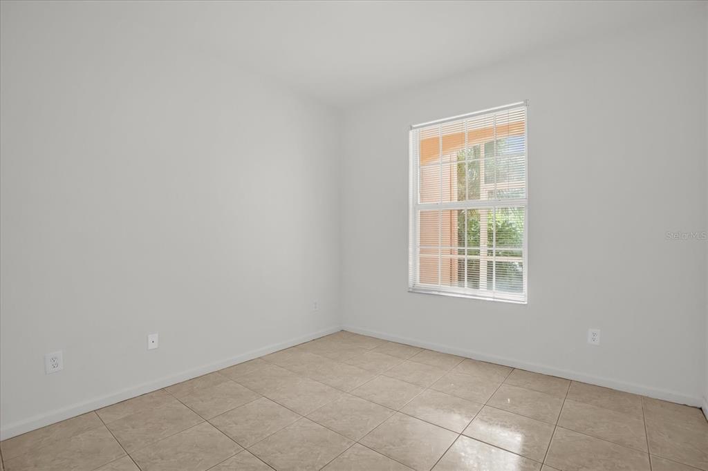 13500 Turtle Marsh Loop, Unit 811 Orlando, FL 32837 - Photo 12 of 23 an empty room with a window