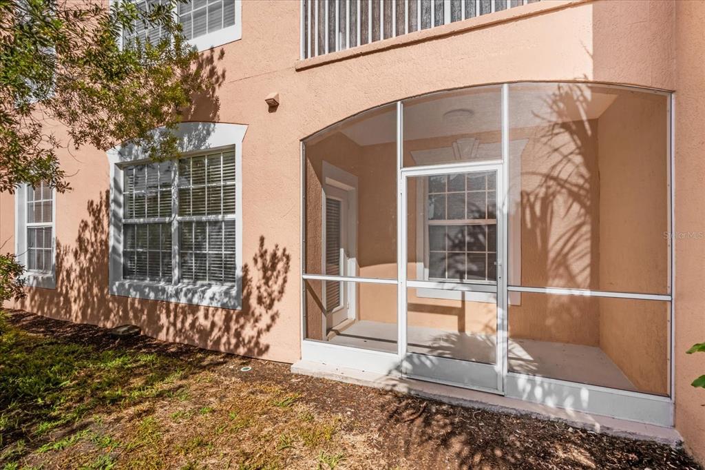 13500 Turtle Marsh Loop, Unit 811 Orlando, FL 32837 - Photo 19 of 23 a front view of a house with a large window