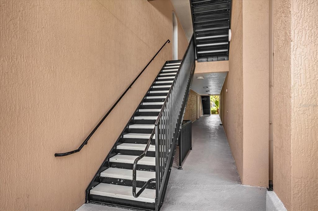 13500 Turtle Marsh Loop, Unit 811 Orlando, FL 32837 - Photo 2 of 23 a view of entryway and gallery with wooden floor