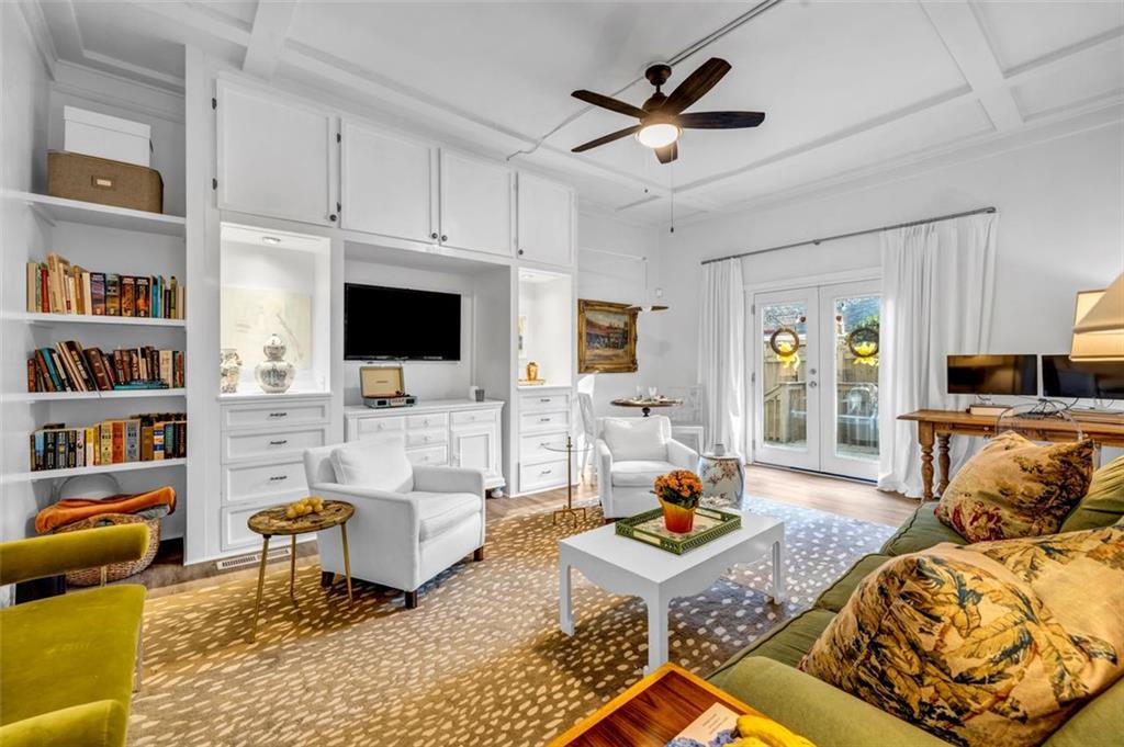 800 Myrtle Street Northeast Atlanta, GA 30308 - Photo 4 of 28 a living room with furniture and a flat screen tv