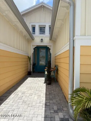 a view of a back yard of the house