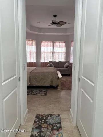 a living room with a couch and a window