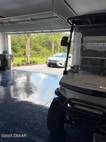 a room with gym equipment and a large window