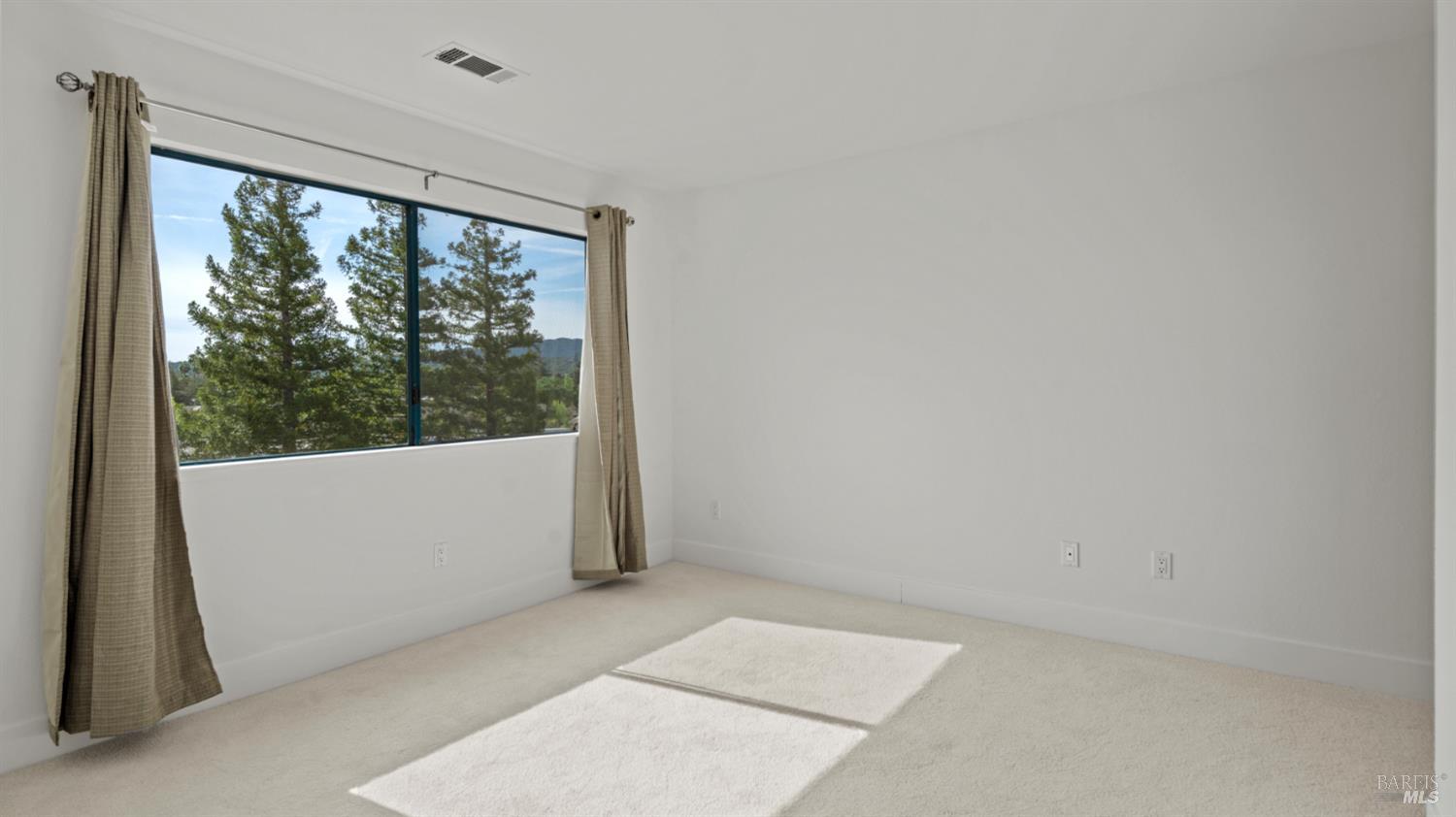 302 Mariner Way Novato, CA 94945 - Photo 14 of 20 an empty room with large windows