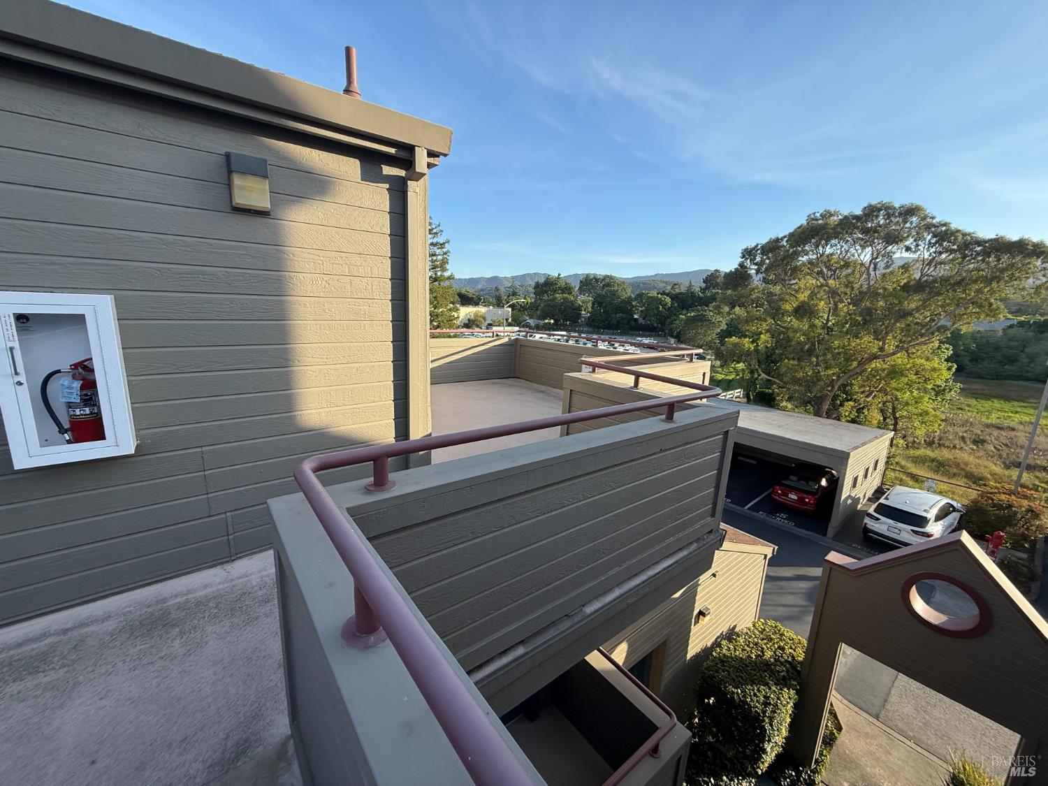 302 Mariner Way Novato, CA 94945 - Photo 17 of 20 a view of a patio with couches and wooden floor